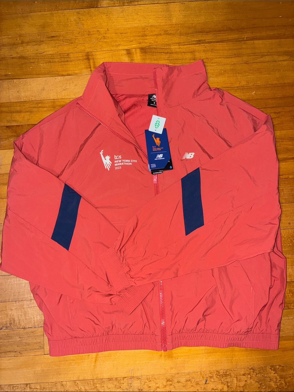 New Balance Women’s 2023 TCS NYC Marathon Zip Up Windbreaker Jacket - Coral